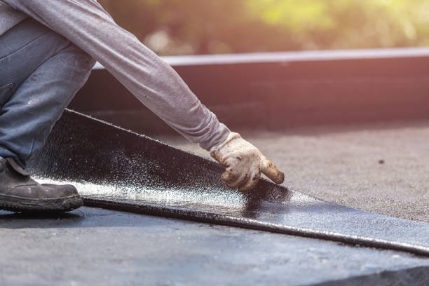 Professional Basement Waterproofing technician working in East Fultonham, OH